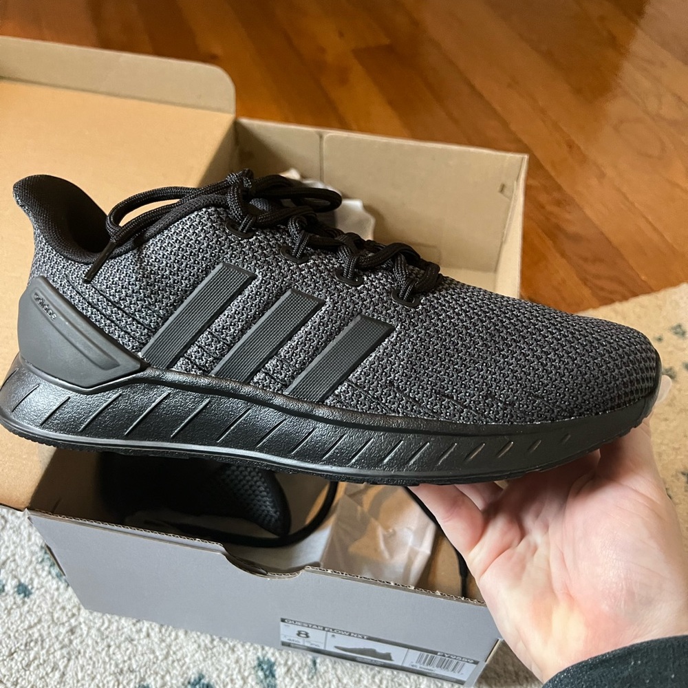 Men’s Adidas NIB black size 8. Never worn Adidas shoes. Questar Flow Cloudfoam.